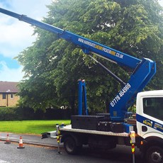 Cherry picker at half extension
