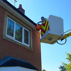 Cherry Picker being used for gutter cleaning